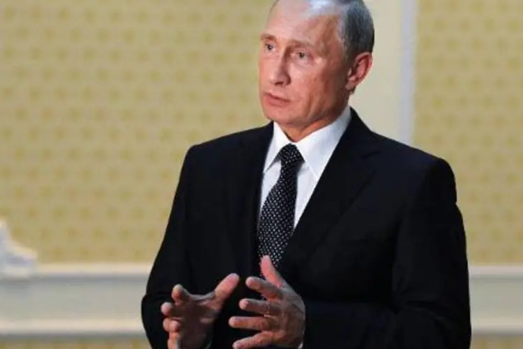 O presidente russo, Vladimir Putin: no leste da Ucrânia, os combates prosseguiam hoje (Mikhail Klimentyev/AFP)