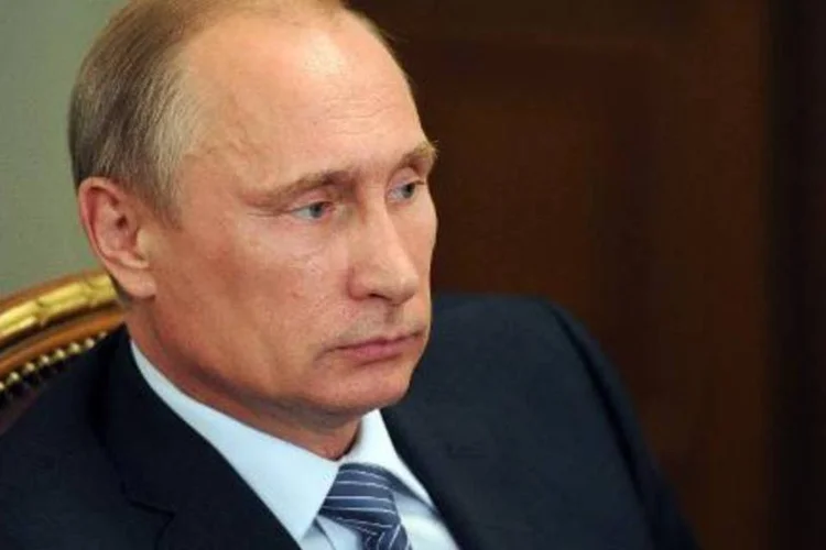 
	Vladimir Putin: presidente assinou um acordo de 400 bilh&otilde;es de d&oacute;lares com a China
 (Mikhail Klimentyev/AFP)
