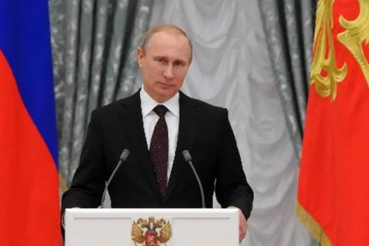 
	O presidente da R&uacute;ssia, Vladimir Putin: embargo contra produtos agr&iacute;colas norte-americanos
 (Mikhail Klimentyev/AFP)