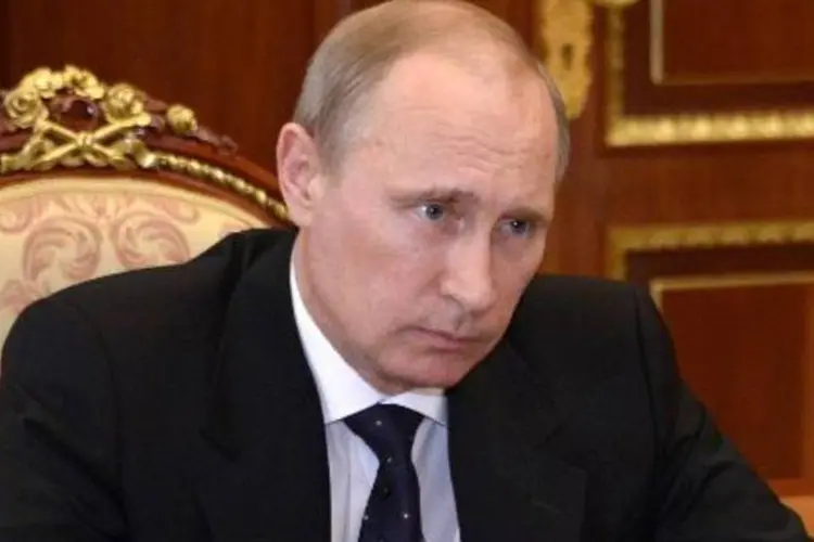 
	Putin: russo mencionou as informa&ccedil;&otilde;es preliminares sobre a queda de um avi&atilde;o de passageiros da Mal&aacute;sial
 (Alexei Nikolsky/AFP)