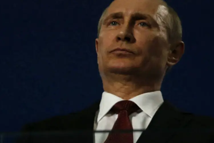 
	Vladimir Putin:&nbsp;Putin tamb&eacute;m parabenizou os militares russos da Frota do Mar Negro, com base na Crimeia, por seu sangue frio e profissionalismo
 (Alexander Demianchuk/Reuters)