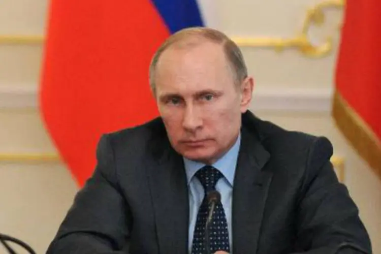 O presidente russo, Vladimir Putin: "em países como Japão e China este sistema funciona, e funciona muito bem" (Mikhail Klimentyev/AFP)