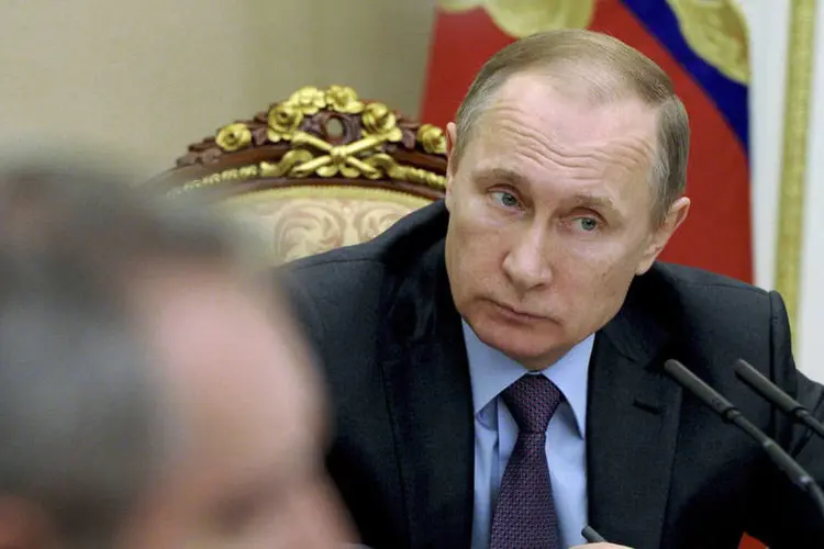 
	Vladimir Putin: ele afirmou aos russos comuns que a crise econ&ocirc;mica do pa&iacute;s ir&aacute; amenizar no ano que vem
 (Mikhail Klimentyev / Reuters)