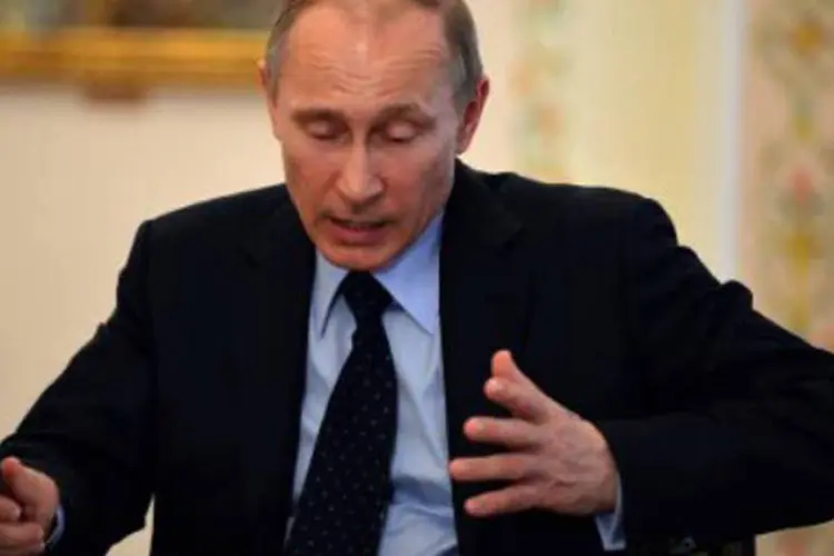 
	O presidente russo, Vladimir Putin: a quest&atilde;o &eacute; delicada porque a R&uacute;ssia est&aacute; na lideran&ccedil;a rotativa do G8 e organiza o pr&oacute;ximo encontro de c&uacute;pula
 (Yuri Kadobnov/AFP)