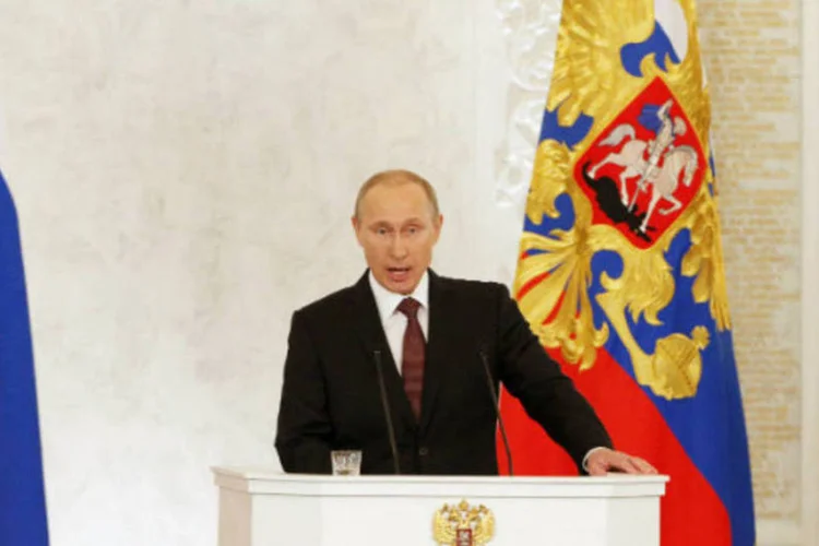 Vladimir Putin durante discurso: "não ajudar a Crimeia teria sido uma traição" (Maxim Shemetov/Reuters)