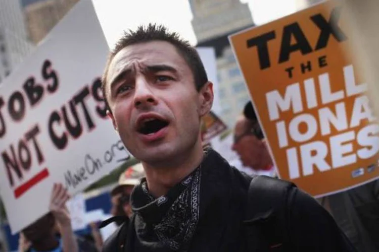 Boa parte dos presentes nos protestos reclamam do corte de empregos nos EUA (Spencer Platt/Getty Images)