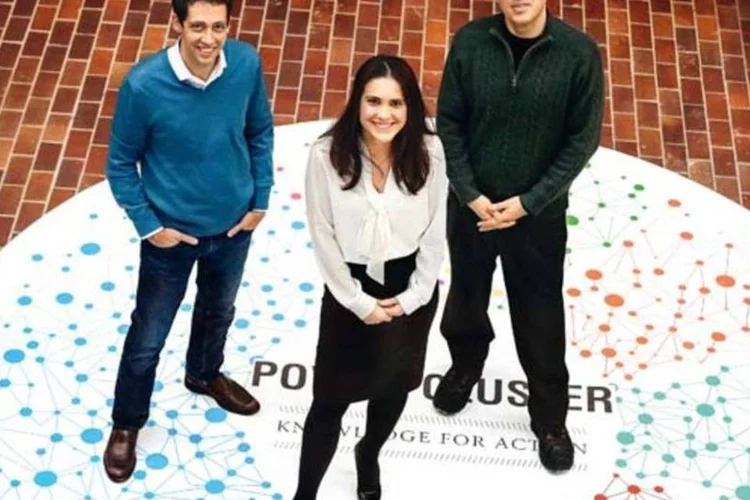 Ferreira (à dir.), Pricila e Lobel, de Wharton: a escola com mais brasileiros (Luiz C. Ribeiro/EXAME)
