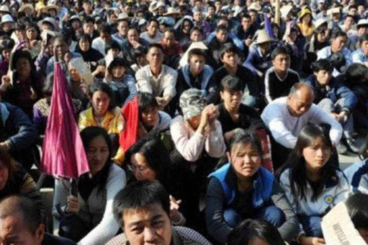 Zhu foi condenado em fevereiro por ter escrevido o poema "É hora, povo chinês!", divulgado na internet em um momento que surgiram protestos populares na China (Mark Ralston/AFP)