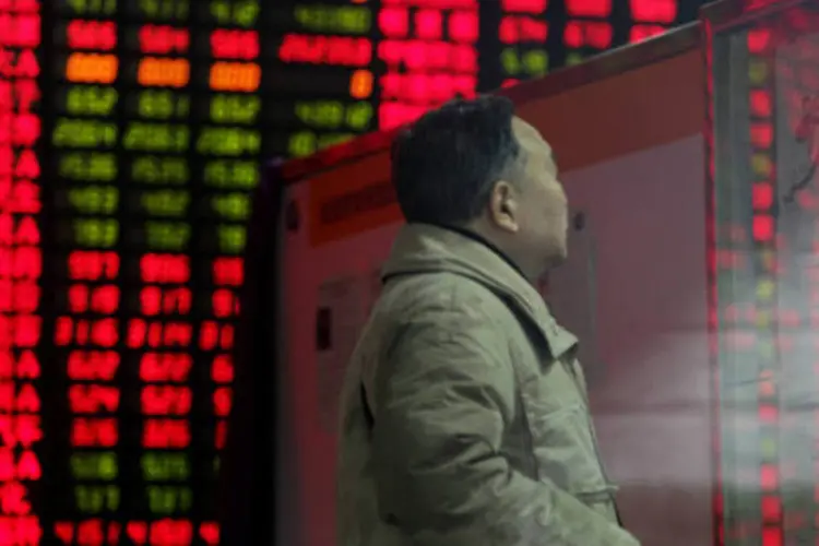 
	Bolsa de Xangai: no preg&atilde;o da segunda-feira, a Bolsa de Xangai sofreu um tombo de 8,5%
 (Tomohiro Ohsumi/Bloomberg)