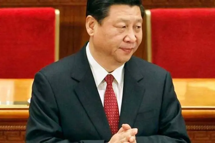 
	Xi Jinping: &quot;Devemos estabelecer firmemente em toda a sociedade a autoridade da Constitui&ccedil;&atilde;o e da lei e permitir &agrave;s massas acreditar totalmente na lei&quot;
 (Lintao Zhang/Getty Images)