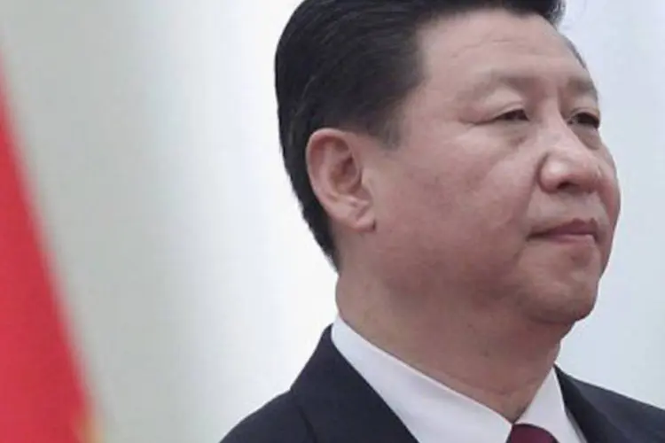 Xi: "no contexto econômico atual, é vital para a China, para os EUA e para o mundo reforçar os vínculos econômicos e comerciais entre os dois países"
 (Feng Li/AFP)