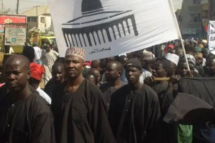 Manifestantes muçulmanos xiitas em passeata pelas ruas de Kano, Nigéria (Aminu Abubakar/AFP)