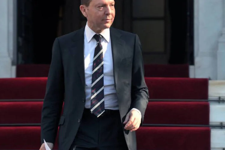 
	Yiannis Stournaras: ministro grego&nbsp;diz ter sido informado de que ser&aacute; recomendado aos ministros da zona do euro o pagamento da parcela de janeiro
 (©afp.com / Louisa Gouliamaki)