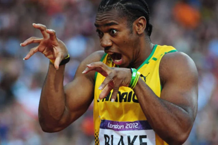 
	Yohan Blake dominou a prova, deixando Gay em segundo lugar, com o tempo de 9s83 e o tamb&eacute;m jamaicano Nesta Carter em terceiro, com 9s95
 (Getty Images)