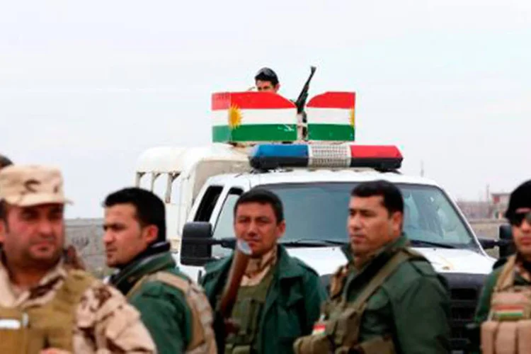 
	Peshmergas: pelo menos 999 morreram e outros 4.596 ficaram feridos desde junho
 (Safin Hamed/AFP)