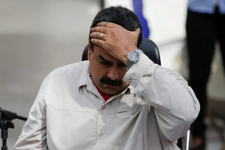 Maduro: "Sou o presidente da República Bolivariana da Venezuela, o chefe de governo e o chefe de Estado por mandato do povo e com o povo seguirei aqui" (Marco Bello/Reuters)
