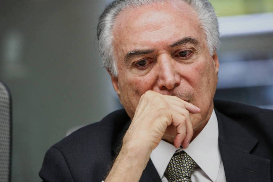 
	Michel Temer: &quot;j&aacute; come&ccedil;amos a colher os frutos. O Brasil come&ccedil;a a entrar nos trilhos&quot;
 (Christopher Goodney/Bloomberg)