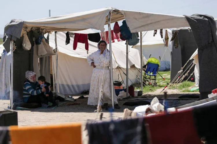 
	Refugiados na Gr&eacute;cia: o objetivo inicial, fixado em setembro de 2015, era o de realocar 160.000 pessoas
 (Getty Images)