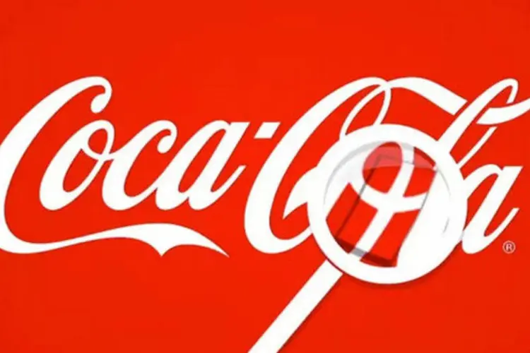 Um outdoor da Coca-Cola distribui gratuitamente bandeirolas ocultas no logo, com a mensagem “Bem-vindo ao país mais feliz do mundo” (Reprodução)