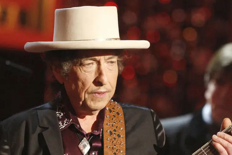 
	Bob Dylan: em 2012, ele recebeu das m&atilde;os de Barack Obama a Medal of Freedom, a honraria civil mais importante dos EUA
 (Kevin Winter/Getty Images)