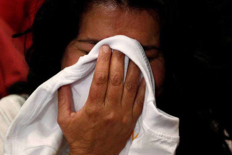
	Acordo: com 99,8% das urnas apuradas, o &quot;n&atilde;o&quot; ao acordo de paz obteve 6.429.730 votos, que equivalem a 50,23% do total
 (John Vizcaino / Reuters)