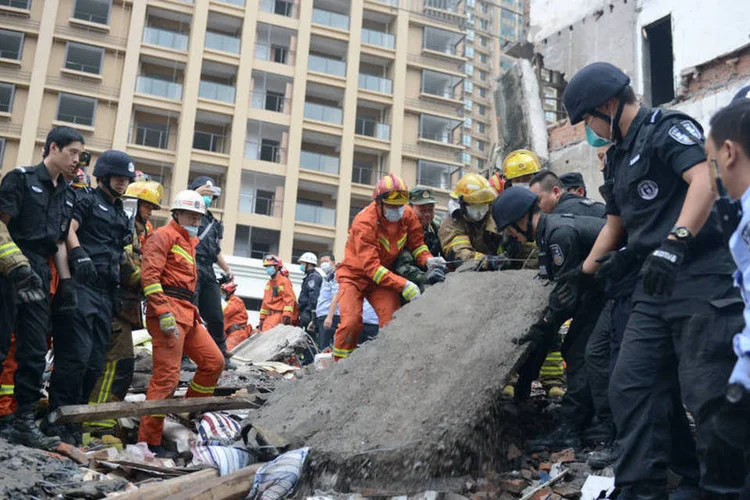 
	China: os pr&eacute;dios estavam situados em um distrito industrial da cidade e abrigavam, sobretudo, oper&aacute;rios
 (Reuters)