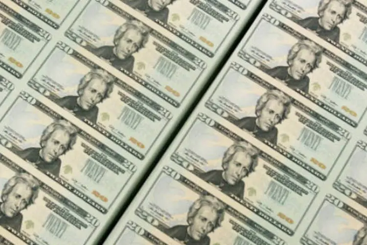 Dólar: no exterior, a moeda norte-americana passou a subir ante os pesos mexicanos e chileno e exibia também leve alta ante uma cesta de moedas (Mark Wilson/Getty Images)