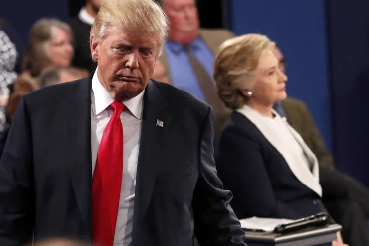 
	Donald Trump: num determinado momento do debate, ele disse que prenderia Hillary se fosse presidente
 (Rick Wilking / Reuters)