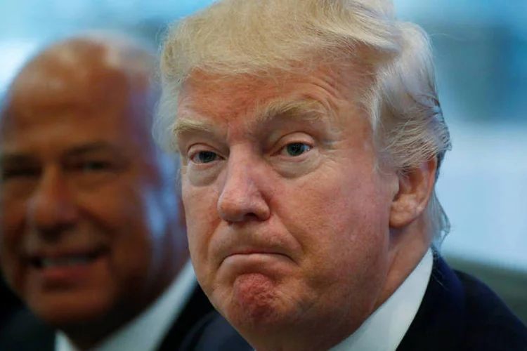 
	Donald Trump: candidato n&atilde;o descarta uma ofensiva, como a infidelidade de Bill Clinton no passado
 (REUTERS/Carlo Allegri)
