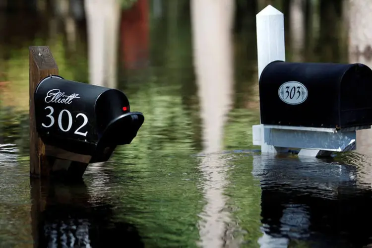 
	Enchentes: nos EUA, o n&uacute;mero de mortos subiu para 22, com quase metade na Carolina do Norte
 (Randall Hill / Reuters)