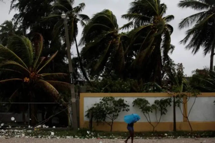 
	Furac&atilde;o: antes de tocar a terra no Haiti, Matthew j&aacute; havia causado inunda&ccedil;&otilde;es em 11 comunidades
 (Andres Martinez Casares / Reuters)