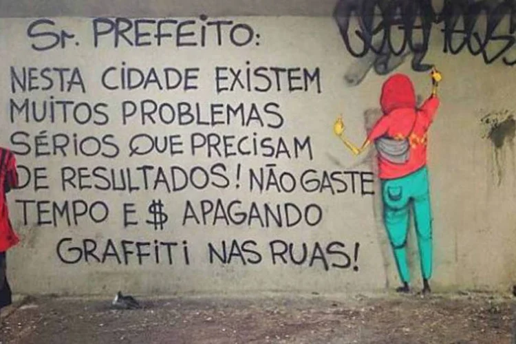 Primeira mensagem de protesto deixada pela dupla Osgemeos, após seus grafites serem apagados
 (Divulgação)