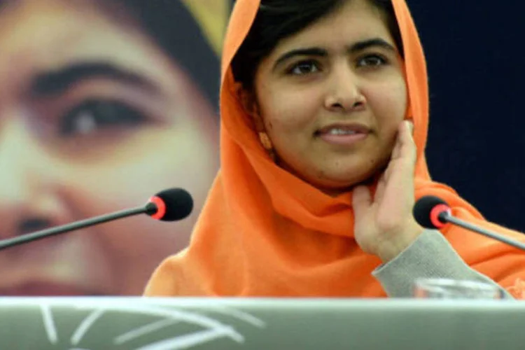 Malala Yousafzai: ela foi premiada por seu combate à opressão contra crianças e jovens e a defesa da educação para todos os menores (PATRICK HERTZOG/AFP/Getty Images)