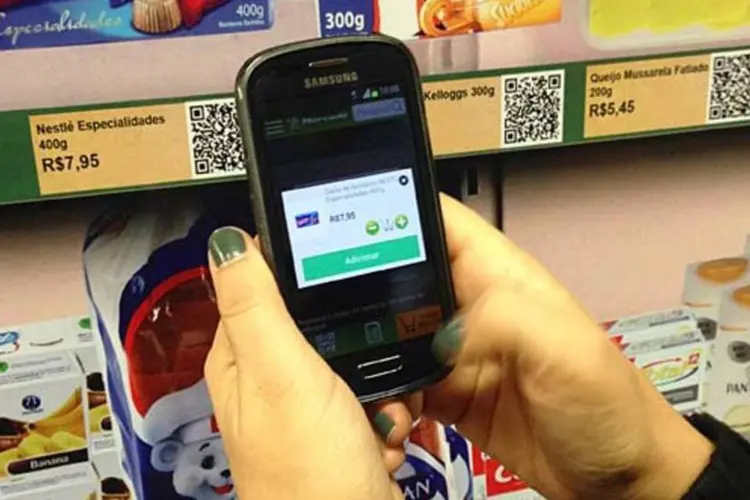 Mercode: um app no smartphone lê o QR Code na etiqueta e registra a compra
 (Divulgação)