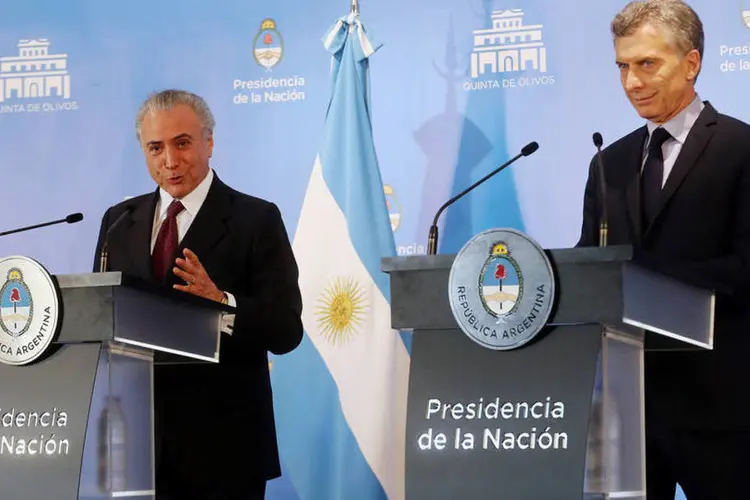
	Michel Temer e Mauricio Macri: os presidentes pediram nesta segunda-feira que a Col&ocirc;mbia d&ecirc; as condi&ccedil;&otilde;es para conseguir a instrumenta&ccedil;&atilde;o do acordo de paz
 (Enrique Marcarian/Reuters)