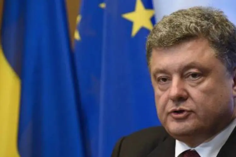 
	Petro Poroshenko: a chancelaria ucraniana e OSCE devem supervisionar cessar-fogo
 (John Thys/AFP)