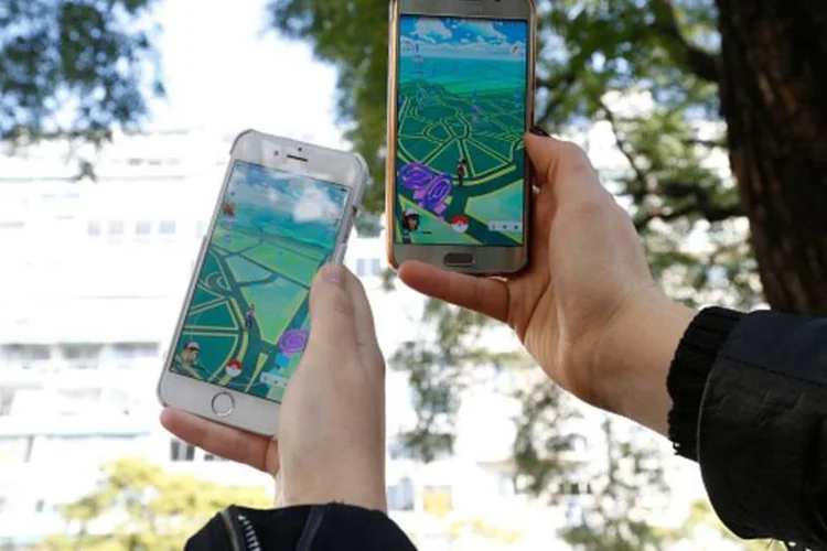 
	Pok&eacute;mon GO: as empresas respons&aacute;veis pelo jogo n&atilde;o s&atilde;o as &uacute;nicas faturando com o novo aplicativo
 (Gabriel Rossi/STF/Getty Images)