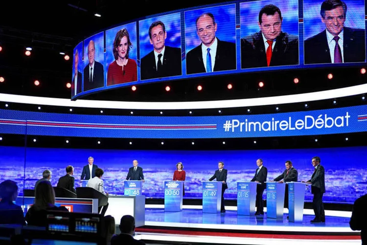 
	Debate: o ex-primeiro-ministro Alain Jupp&eacute; aparece como favorito, &agrave; frente do ex-presidente Nicolas Sarkozy
 (Martin Bureau/Pool/Reuters)