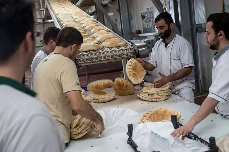 
	Refugiados no trabalho: governo quer fazer os investimentos iniciais para inspirar empresas a assumirem os projetos
 (Getty Images)