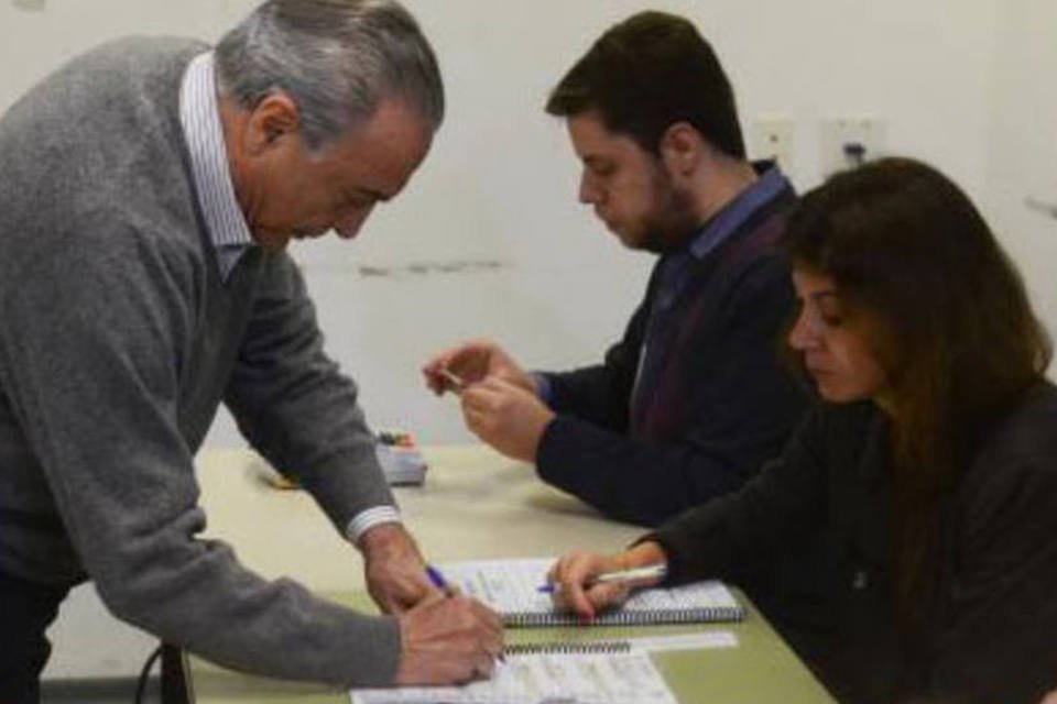 
	Temer: o presidente apareceu na PUC, onde fica sua se&ccedil;&atilde;o eleitoral, logo ap&oacute;s as urnas serem ligadas
 (Rovena Rosa/Agência Brasil)
