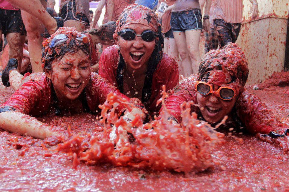 10 fotos da maior guerra de tomates do mundo