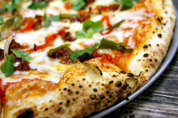 
	Pizza feita pela Zume: o neg&oacute;cio consegue produzir at&eacute; 300 pizzas por hora
 (Reprodução/Facebook/Zume)