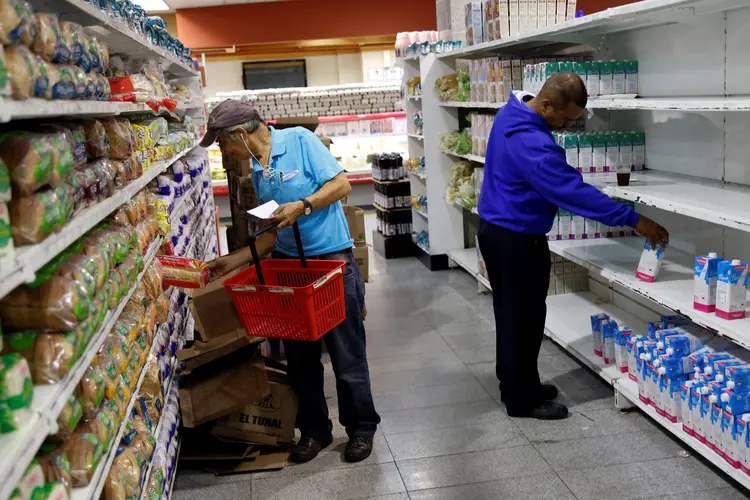 Caracas: milhares de contêineres de comidas de festa e brinquedos estão a caminho, dizem autoridades (Carlos Garcia Rawlins/Reuters)