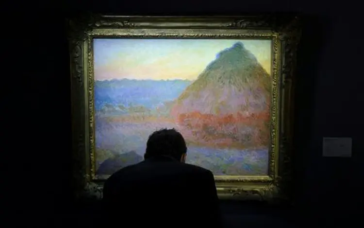 Quadro Meule, de Monet: recorde anterior era de junho de 200, quando "Le bassin aux nymphéas" foi vendido por US$ 80,4 milhões (Tengku Bahar/AFP)