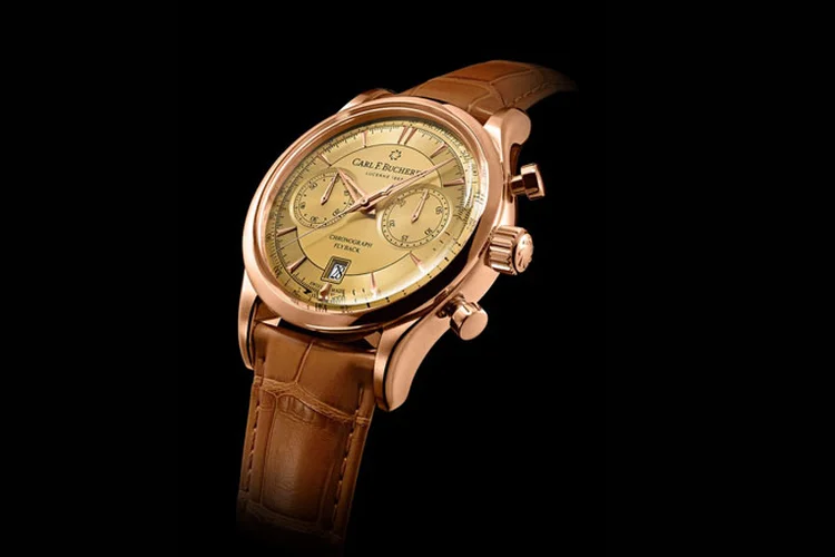 Manero Flyback: ele ganha destaque com a trilha de minutos estampada em um tom dourado mais escuro