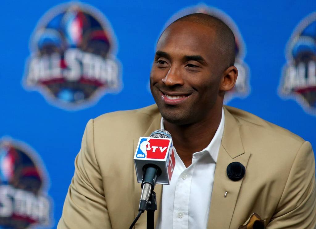 NEW ORLEANS, LA - FEBRUARY 16:  Kobe Bryant of the Los Angeles Lakers addresses the media before the 2014 NBA All-Star game at the Smoothie King Center on February 16, 2014 in New Orleans, Louisiana. NOTE TO USER: User expressly acknowledges and agrees that, by downloading and or using this photograph, User is consenting to the terms and conditions of the Getty Images License Agreement.  (Photo by Ronald Martinez/Getty Images)