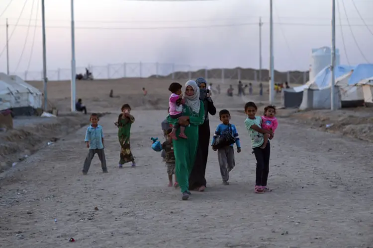 Refugiados em Mosul: "As famílias na área oeste de Mossul nos dizem que escapar não é uma opção. Se tentam fugir se arriscam a execuções sumárias por parte de combatentes do EI" (Getty Images)