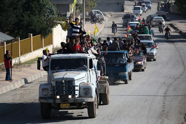 Síria: um "grupo de terrorista estrangeiro aliado ao regime sírio" abriu fogo contra o comboio, diz a agência (Getty Images)