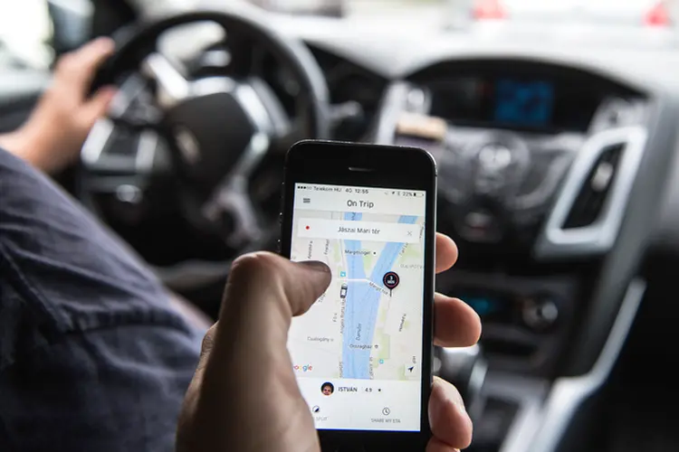 Aplicativo do Uber: empresa foi autuada por ferir direitos do consumidor (Akos Stiller/Bloomberg)