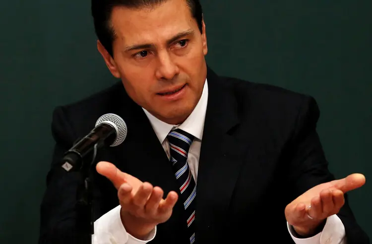Peña Nieto: mais cedo, Trump avisou que ele poderia cancelar a reunião se não fosse pagar o muro na fronteira (Carlos Jasso/Reuters)